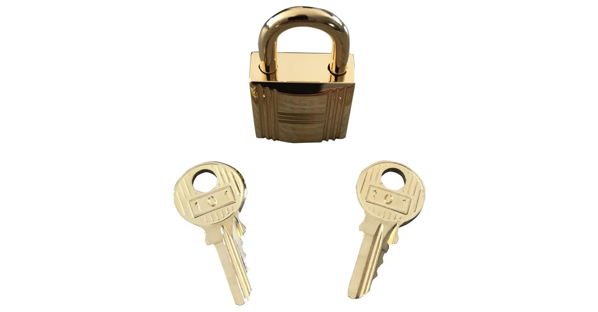 Candado de acero dorado Hermès para Kelly y Birkin Gold hardware 