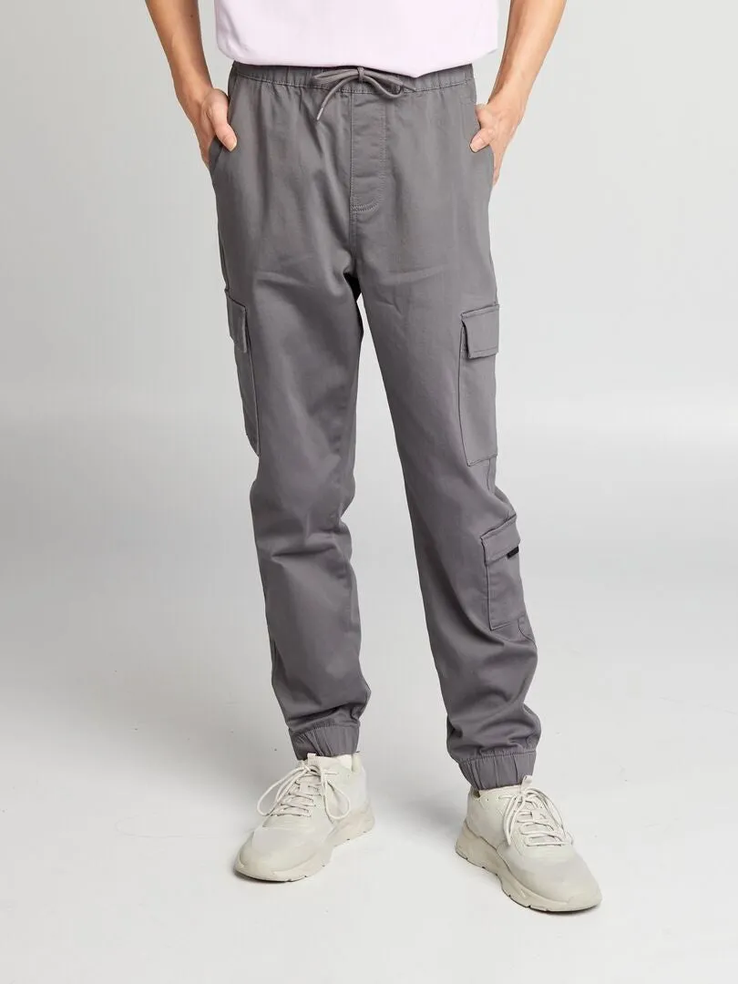 PANTALóN CON BOLSILLOS EN LOS LATERALES  GRIS