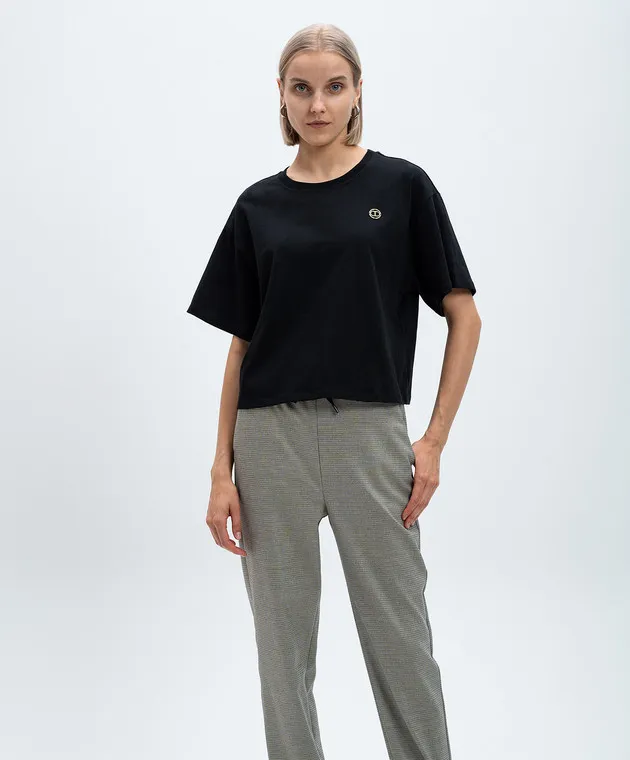 TWINSET BLACK TSHIRT WITH A METALLIC OVAL T LOGO WITH CRYSTALS